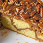Delicious Pecan Upside Down Cake with caramelized pecans and fluffy vanilla cake.