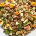 Colorful Fall Harvest Quinoa Salad with butternut squash, apples, and cranberries