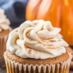 Moist Pumpkin Cupcakes topped with creamy cinnamon cream cheese frosting.