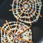 Delicious Pretzel Spider Webs with chocolate for Halloween treats