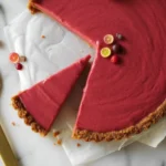 Cranberry-Orange Curd Tart with a crumbly crust and vibrant garnet hue