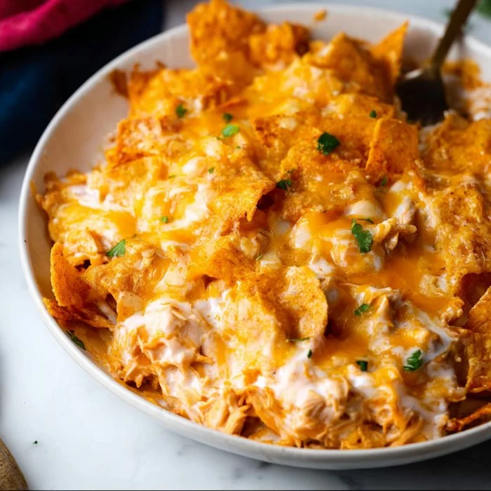 Delicious Doritos Cheesy Chicken Casserole served in a baking dish