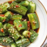 Quick Spicy Asian Cucumber Salad with cucumbers, garlic, and chili dressing.
