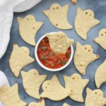Spooky Baked Halloween Chips served with bloody salsa perfect for Halloween parties.