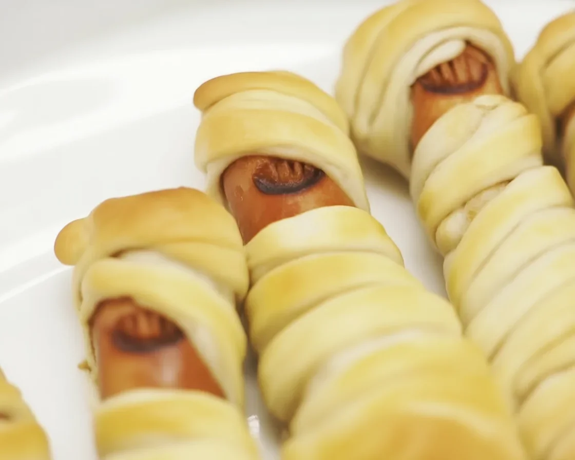 Halloween Mummy Hotdogs made with veggie sausages wrapped in pastry