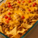 Delicious Walking Taco Casserole served in a bowl with toppings