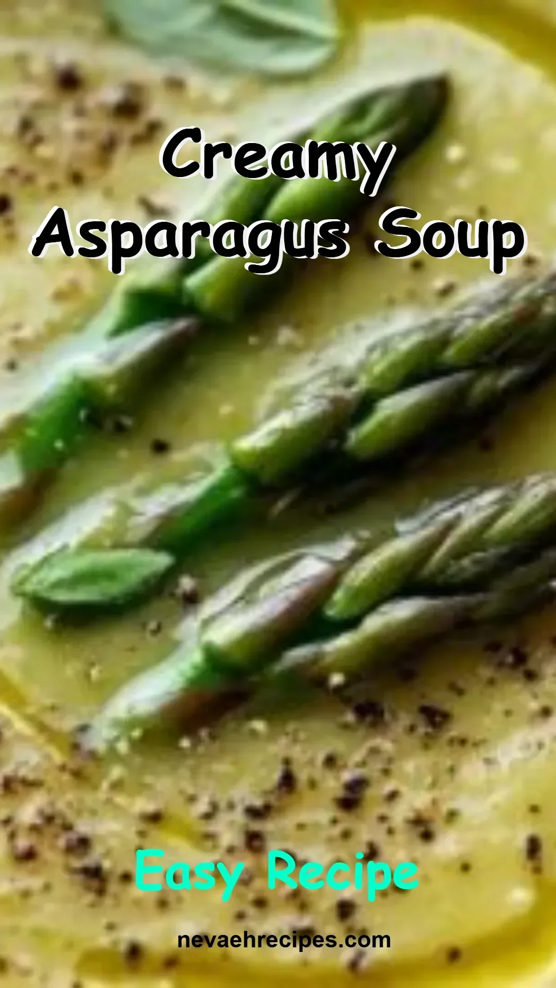 Bowl of creamy asparagus soup garnished with fresh asparagus tips