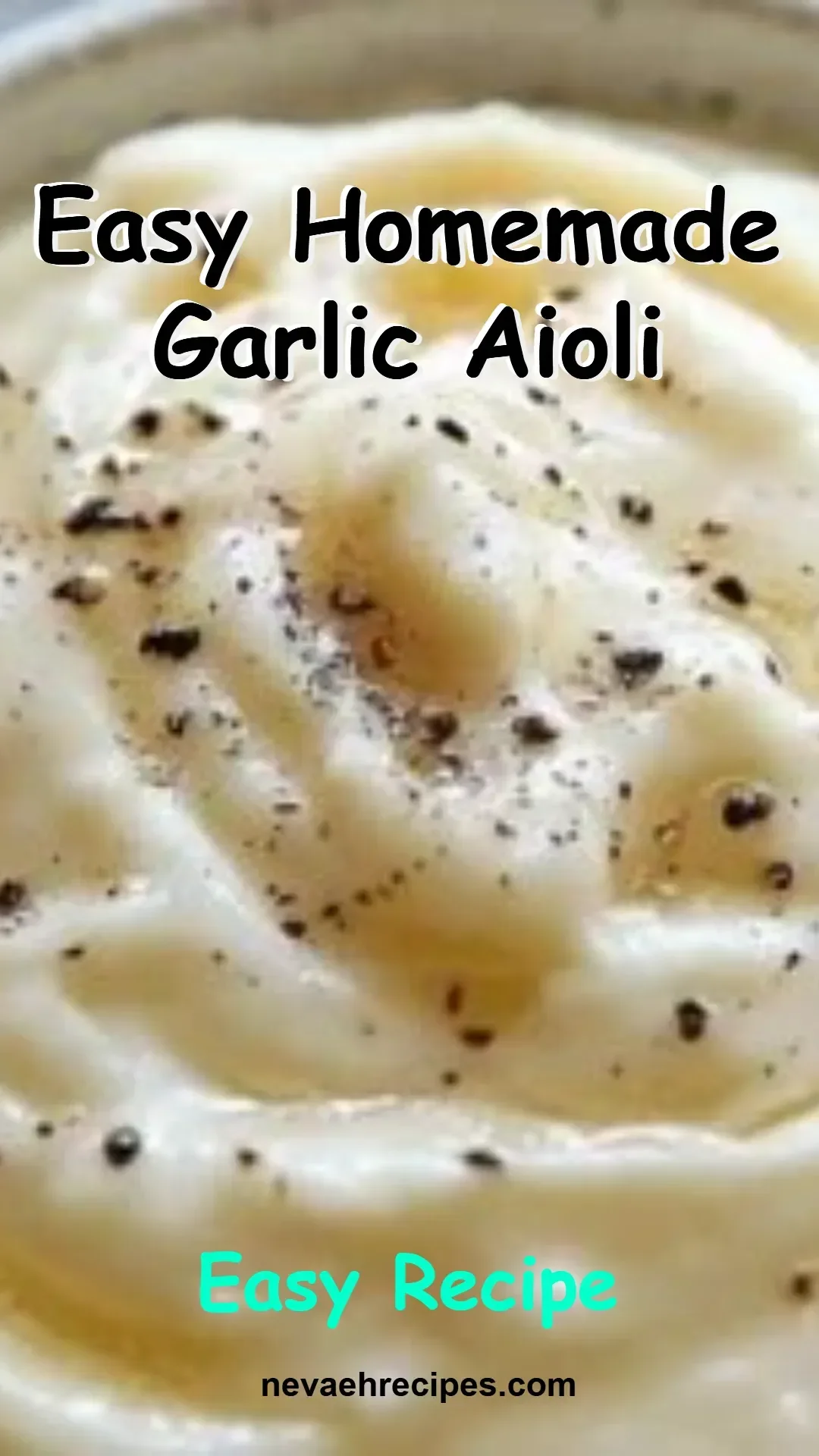 Easy homemade garlic aioli in a bowl with garlic cloves and fresh herbs
