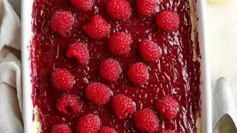 Fresh Raspberry Tiramisu layered with raspberry and cream
