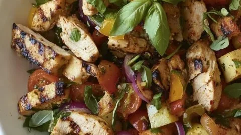 Grilled Chicken Panzanella Salad with fresh vegetables and herbs