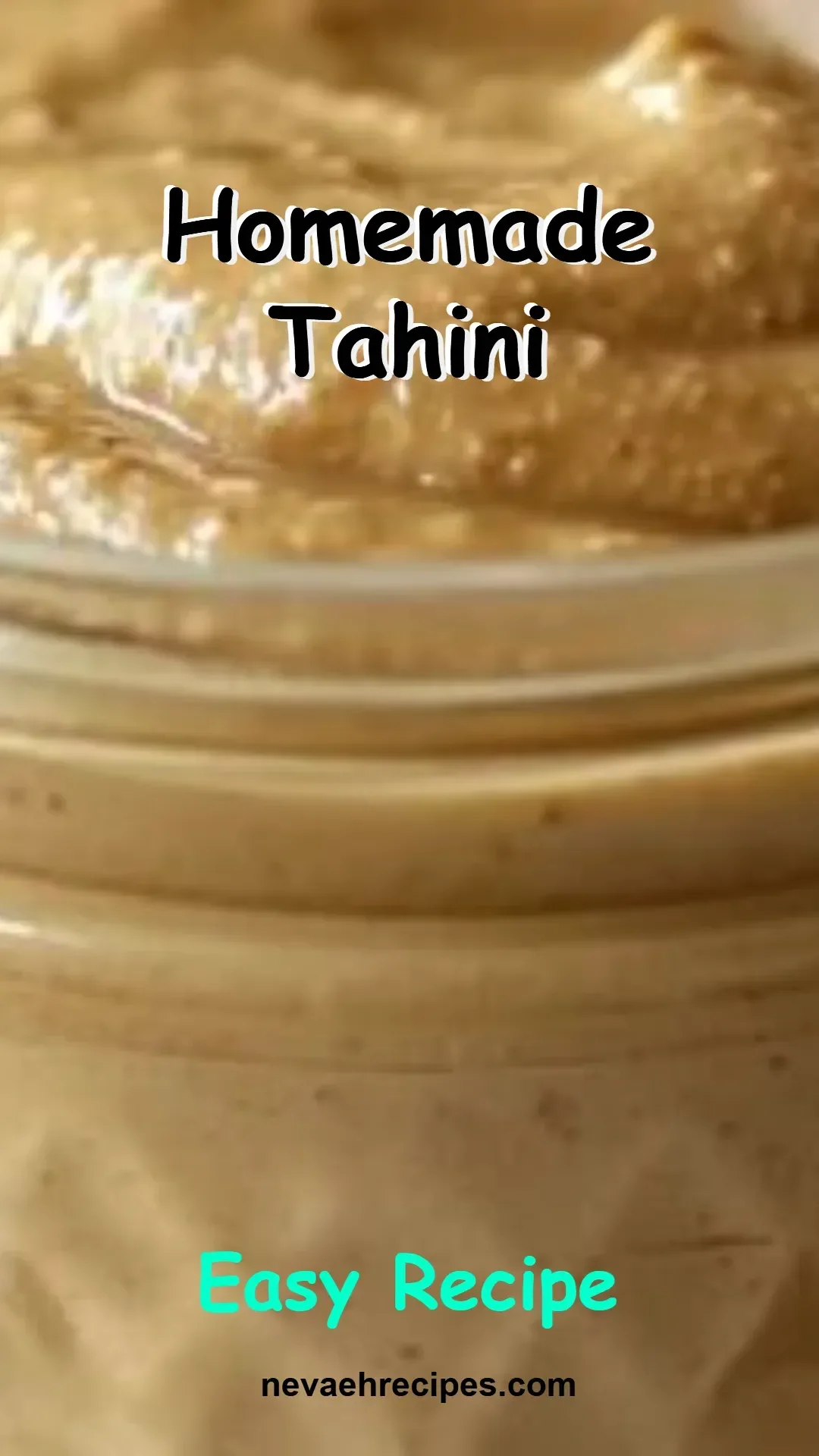 Bowl of homemade tahini with sesame seeds and olive oil