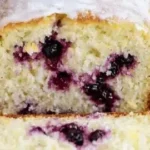 Freshly baked Lemon Blackberry Loaf with a bright and fruity appearance
