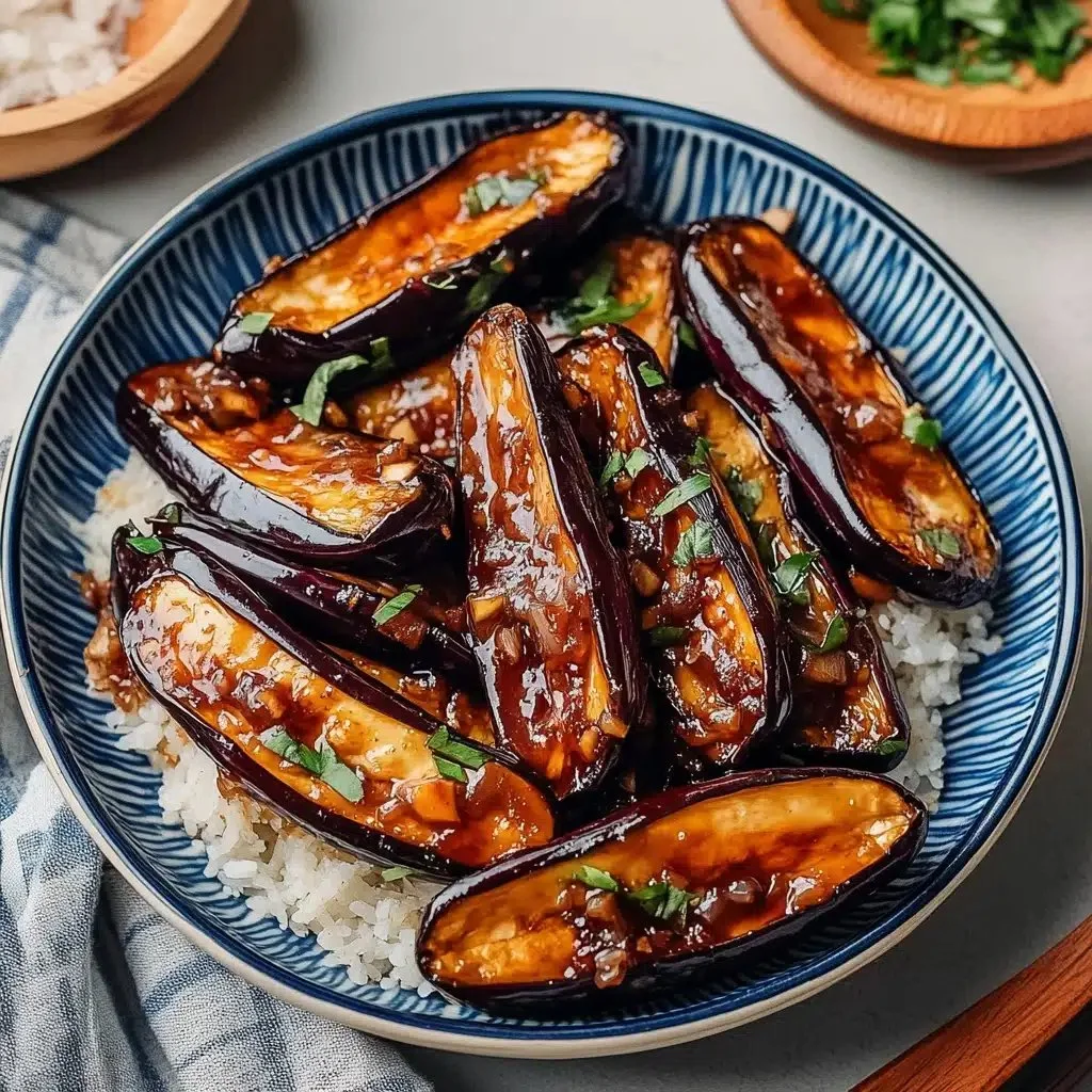 Sticky Garlic Eggplant dish with rich sauce and vibrant colors.