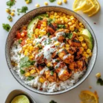 Delicious Street Corn Chicken Rice Bowl with chicken, corn, and rice