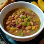 A bowl of slow cooker pinto beans, showcasing a hearty and delicious comfort food recipe.