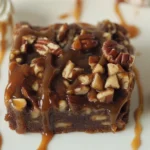Delicious caramel pecan brownies topped with crunchy pecans and gooey caramel.