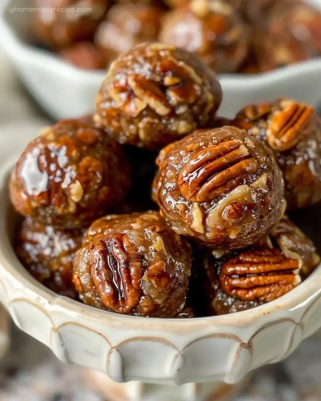 Delicious easy pecan pie balls displayed on a festive table.