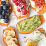 Delicious sweet potato toast topped with avocado and nut butter for a healthy breakfast.