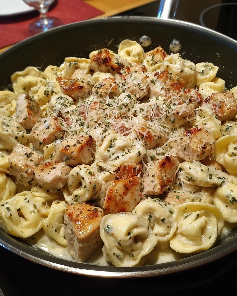 Delicious Italian Parmesan Chicken Tortellini served in a creamy sauce
