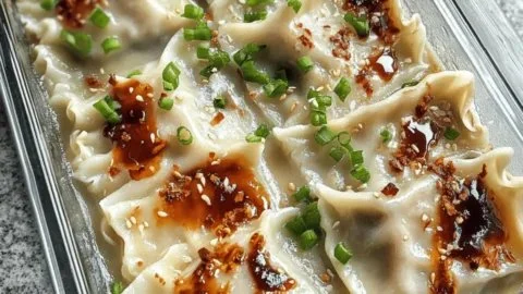 One Pan Miso Coconut Baked Dumplings served with a unique sauce.