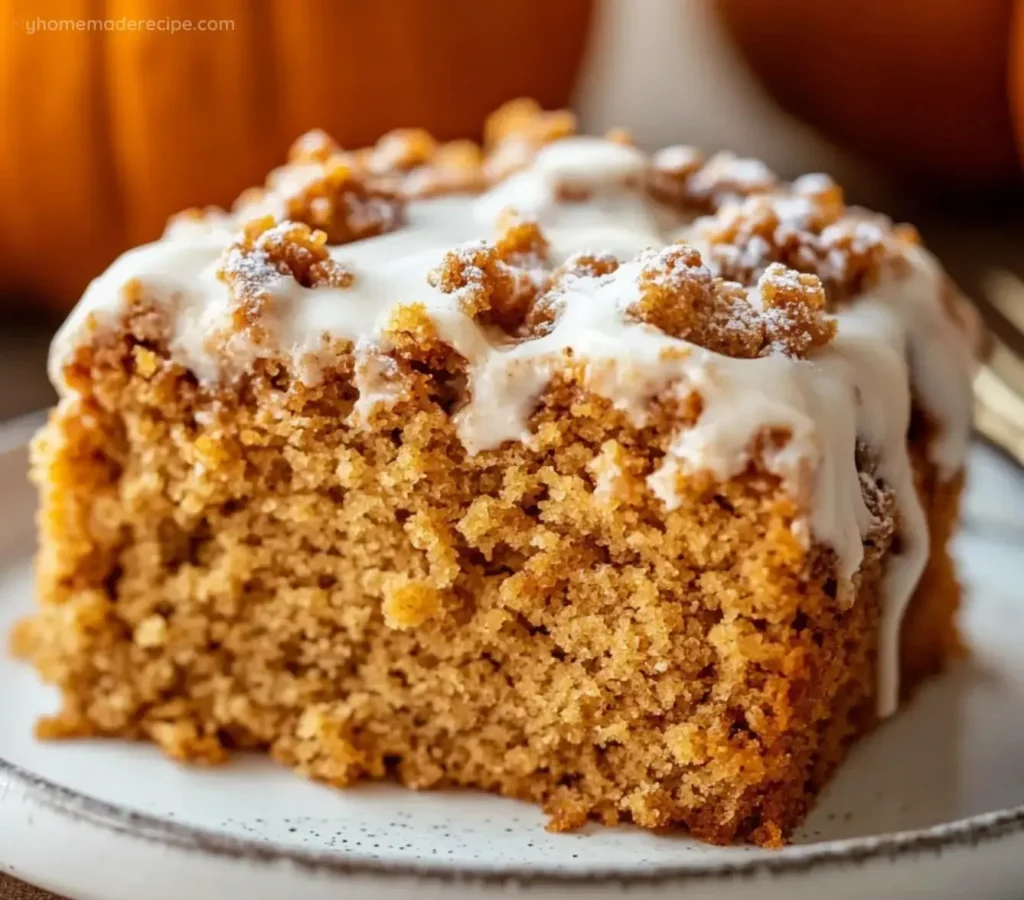 Slice of delicious Pumpkin Coffee Cake with spices and coffee beans
