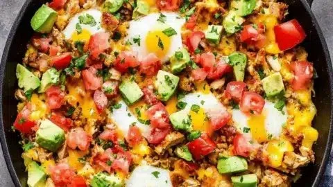 Delicious Southwest Turkey and Egg Breakfast Skillet served in a colorful dish
