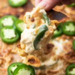 Delicious Jalapeno Cream Cheese Dip with jalapeños and cream cheese in a serving bowl.