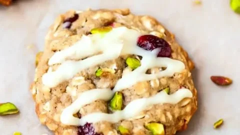 Cranberry pistachio oatmeal cookies displayed on a festive plate