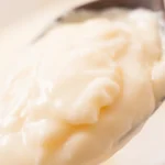 Creamy Cheese Pretzel Dip served with soft pretzels and crackers.