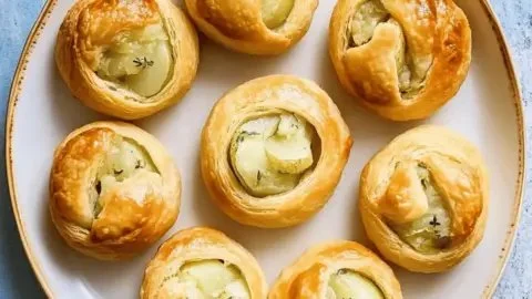 Delicious homemade potato knish served on a plate, perfect comfort food.