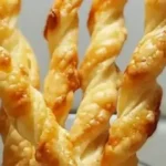 Delicious cheese straws served as a quick appetizer.
