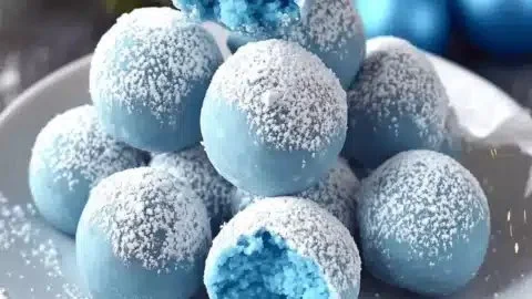 Festive blue Christmas truffles decorated for the holiday season