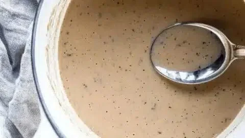 Delicious make-ahead white wine gravy poured over a festive holiday meal.