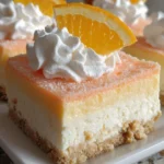 Orange Creamsicle Dream Bars dessert with orange and cream layers
