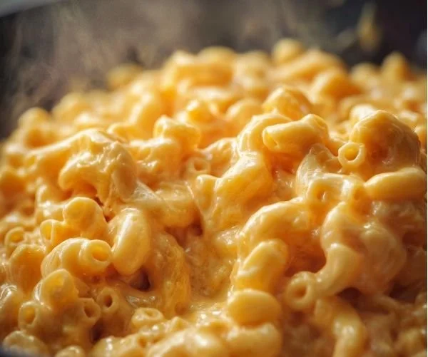 Creamy stovetop mac and cheese ready to serve in a bowl.