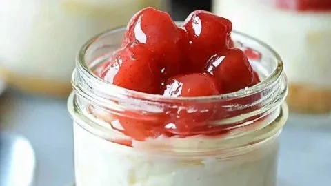 Delicious Mason Jar Cheesecake served in glass jars for dessert lovers