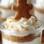 No-bake gingerbread cheesecake cups topped with festive decorations