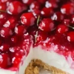 Delicious no-bake old-fashioned cherry cheesecake topped with fresh cherries